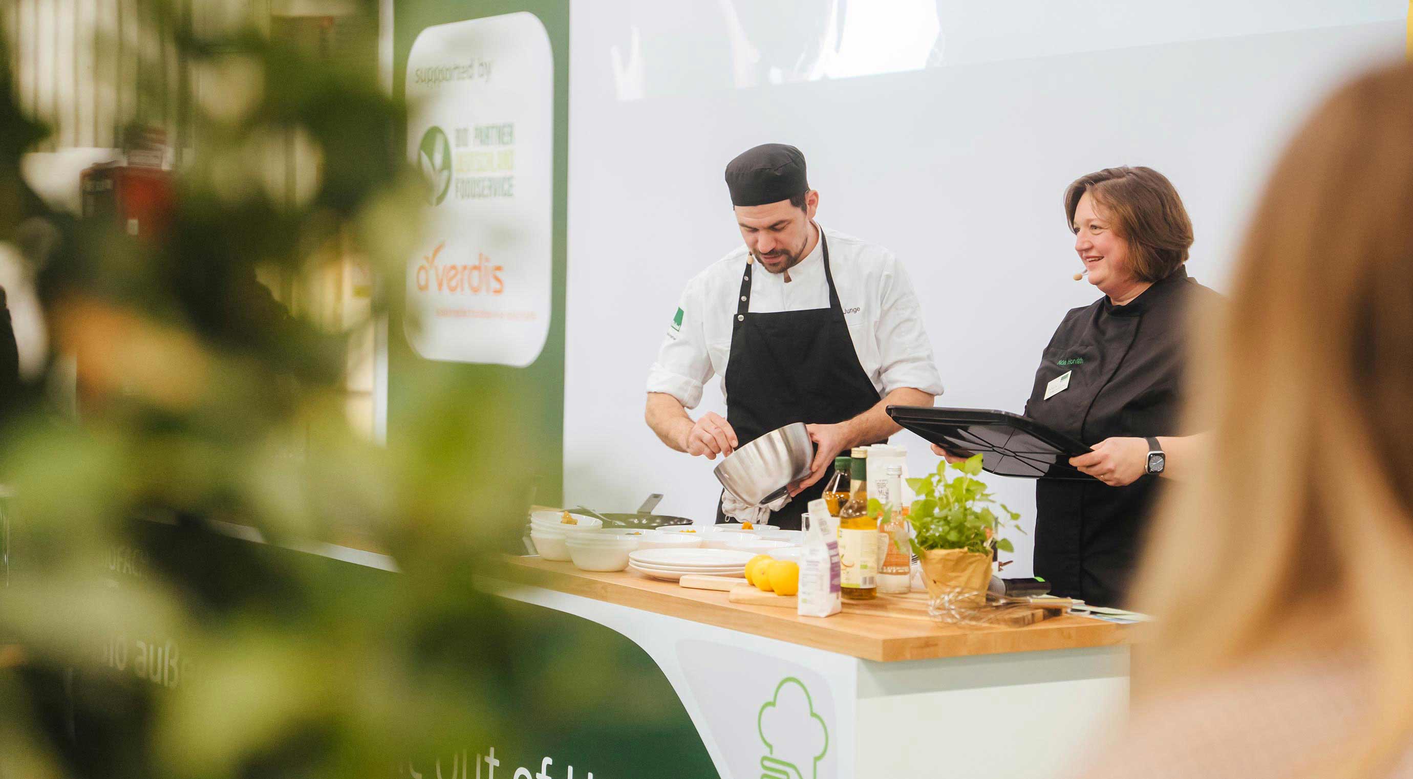 Cooking show with two people in the special area ‘Organic out of home’